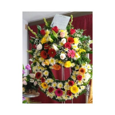 Corona Funeraria Multicolor con Copete de Gerberas y Lirios